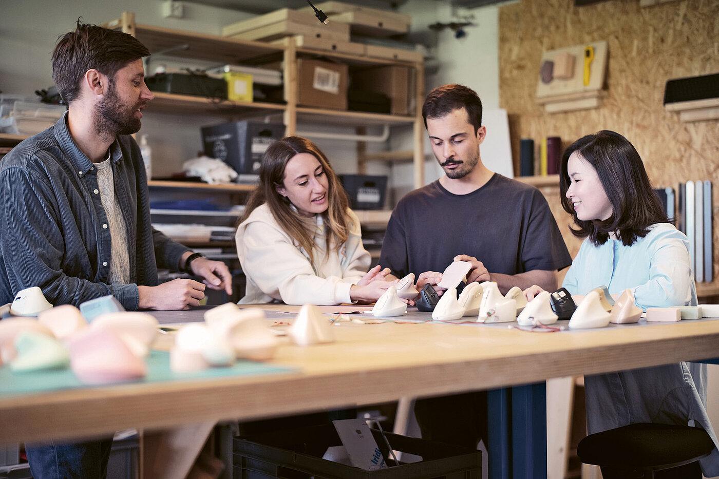 Designer reviewing an ergonomic posture assessment of a product prototype